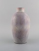 Nils Thorsson 
for Royal 
Copenhagen. 
Vase in glazed 
ceramics with 
leaf 
decoration. 
Dated ...