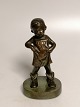 Bronze figure in the form of a girl unsigned Height 14.5cm.