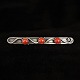 Just Andersen; 
A brooch made 
of sterling 
silver, set 
with corals, 
design 314. 
Stamped ...