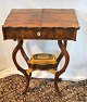 Nyrococo sewing 
table in 
mahogany, 19th 
century 
Denmark. On 
four capriole 
legs. With 
movable ...