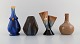 Four retro 
vases in glazed 
ceramics. 
Belgium, 1960s 
/ 70s.
Largest 
measures: 20.5 
x 9.5 cm.
In ...