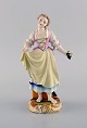 Antik Meissen figur i håndmalet porcelæn. Pige med vindruer. Marcolini perioden 
1774-1814.
