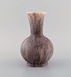 Antique Zsolnay 
vase in glazed 
ceramisc with 
pink 
undertones. 
Modern design, 
approx. ...