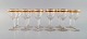 Baccarat, Frankrig. Tolv art deco hedvinsglas i mundblæst krystalglas med 
gulddekoration i form af blade. 1930