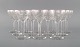 Val St. Lambert, Belgium. Twelve white wine glasses in clear mouth-blown crystal 
glass. 1930s.
