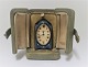 Zenith. Silver 
minature clock 
with enamel 
(925) in the 
original box. 
Height 5 cm. 
The clock 
works.