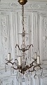 Very beautiful 
5-armed 
chandelier hung 
with numerous 
large crystals.
Diameter 46 
cm. Height 90 
cm.
