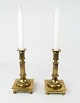 Set of two 
candlesticks in 
brass, in great 
antique 
condition from 
the 1920s.
22 x 10 cm.