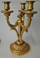 French bronze 
candlestick, 
Louis XVI 
style, approx. 
1900. With 
three light 
arms. In the 
foot ...