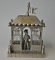 German perfume holder, 19th century. Silver-plated brass. Designed as a house with flags on the ...