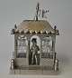 German perfume 
holder, 19th 
century. 
Silver-plated 
brass. Designed 
as a house with 
flags on the 
...