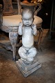 "Nina on the Ball" - "The Little Globetrotter" 
figure by Kai Nielsen (1882-1924) in glazed stoneware. 
Height: 62cm.