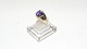 Elegant lady 
ring with 
purple stone 14 
carat gold
Stamped 585
Size 55
The check by 
the ...