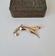 Vintage brooch 
in 8 kt gold by 
Bernhard Hertz 
Stamped: BH-BH
Length 5.2 cm.