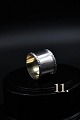 Old napkin ring 
in silver - 
stamped.
11) 
Dia.:4,8cm. W: 
3.8cm.