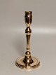 High 
Candlestick of 
brass approx 
1880 Height 
23.5cm.