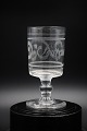 Old French 
souvenir wine 
glass with 
engraved 
writing and 
decorations. 
"souvenir" 
H:13cm. 
dia.:6,5cm.