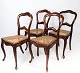 Set of four rococo dining room chairs of mahogany and with seat of paper cord from 1860. The ...