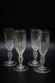 12 pcs. , old 
champagne 
flutes in 
crystal glass 
with classic 
grinding and 
fine foot. 
H:17cm. ...
