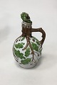 Lomonosov Vodka 
bottle 
decorated with 
oak leaves. 
Measures 21 cm 
/ 8 17/64 in. 
The plug is 
loose