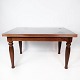 Dining table in 
 mahogany with 
dark top plate 
and extensions, 
in great 
antique 
condition from 
...