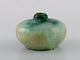 Pieter Groeneveldt (1889-1982), Dutch ceramicist. Unique vase in glazed 
ceramics. Beautiful glaze in shades of blue-green. Mid-20th century.
