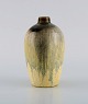 Pieter Groeneveldt (1889-1982), Dutch ceramicist. Unique vase in glazed 
ceramics. Beautiful glaze in yellow and black shades. Mid-20th century.
