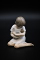 Royal Copenhagen porcelain figure of girl sitting with her little sister 
(girl & baby) H:13cm.
RC# 1938.