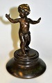 Danish artist (20th century) A naked little boy. Bronze. The foot is filled. H .: 17 cm. Dia. ...
