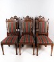 Set of six dining room chairs of oak and upholstered with striped fabric, from around 1920. The ...