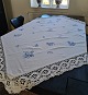 Embroidered 
tablecloth with 
Blue Flower 
pattern 
Dimension 153 
x 153 cm.