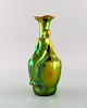 Zsolnay art nouveau vase in glazed ceramics modeled with sitting woman.  
Beautiful luster glaze. 1920/30