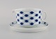 Tapio Wirkkala for Rosenthal. Corinth butter jug on saucer in blue painted 
porcelain. Modernist Finnish design. Dated 1979-80.
