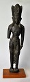 Antique Indian 
wooden figure 
of standing 
man, 18./19. On 
the newer 
plinth of 
mahogany.
NB: Part ...