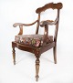 Antique armchair of mahogany and upholstered with floral fabric from the 1880s. H - 98.5 cm, W ...