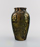 Lucien Brisdoux 
(1878-1963), 
France. Vase in 
glazed 
stoneware. 
Beautiful glaze 
in gold and ...