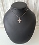 Dagmr cross 
with necklace 
in silver 
Stamped 925s
Length of 
chain 38 cm.
Measure on 
cross 22 ...