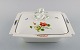 Square Meissen porcelain lidded tureen with turned lid knob and hand-painted 
flowers. Late 19th century.
