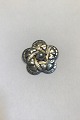 Georg Jensen 
Sterling Silver 
Brooch No 12 
Measures Diam 
4.2 cm( 1 21/32 
in) Weight 18.2 
gr/ 0.64 oz