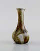 Swedish 
ceramicist. 
Unique vase in 
glazed 
stoneware. 
1980s.
Measures: 11 x 
6.2 cm.
In ...