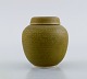 Susanne & 
Christer, 
Sweden. Lidded 
jar in glazed 
ceramics. 
Beautiful glaze 
in light earth 
tones. ...