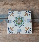 Polychrome 
Decorated Dutch 
tile with 
floral motif 
17th century
Dimension 13 x 
13 cm.