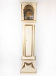 Grandfather 
clock of white 
painted wood 
decorated with 
gold from the 
1820s. The 
clock is in ...