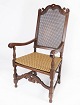Antique armchair of oak, with original upholstery of light fabric and paper cord, from the ...