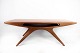 The coffee 
table "Smilet" 
in teak, 
designed by 
Johannes 
Andersen and 
manufactured by 
CFC ...