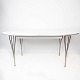 Super Ellipse 
spisebord med 
hvid laminat 
designet af 
Piet Hein og 
Arne Jacobsen, 
samt ...