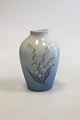 Bing & Grøndahl 
Vase No 57/239 
with Lily of 
the Valley 
Flower Motif. 
Measures 17 cm 
/ 6 11/16 in.