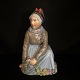 Royal Copenhagen, Carl Martin Hansen; a porcelain figurine of a Fanø girl #12413