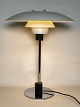 PH 4/3 table lamp with shade set of white metal. Mounted with black cord with on and off ...
