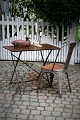 Old French café table in polished iron. The table can be folded. The table is finished and ...